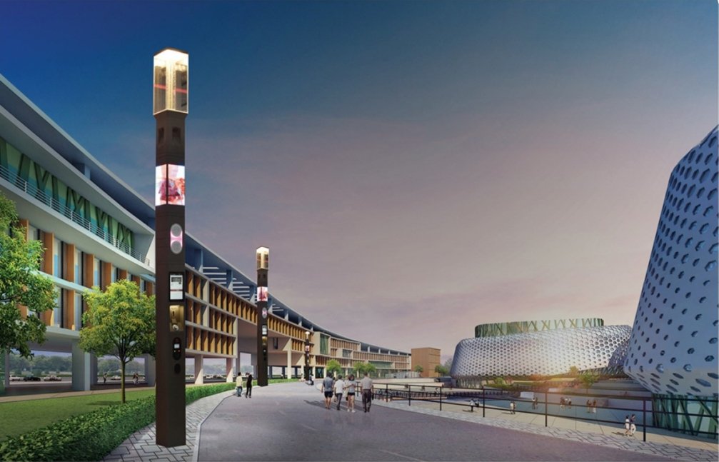 Modern smart streetlights with digital displays along a walkway in an urban area, integrating LED lighting with smart technology for enhanced connectivity and public information. Contemporary buildings and public spaces in the background showcase advanced urban design and smart infrastructure.