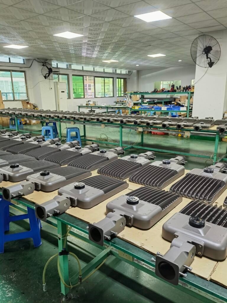 High-quality motion sensor streetlights arranged on a production line in a modern factory for efficient assembly and quality control.