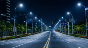 LED road lighting project on modern commercial city road with uniform cold white street lights